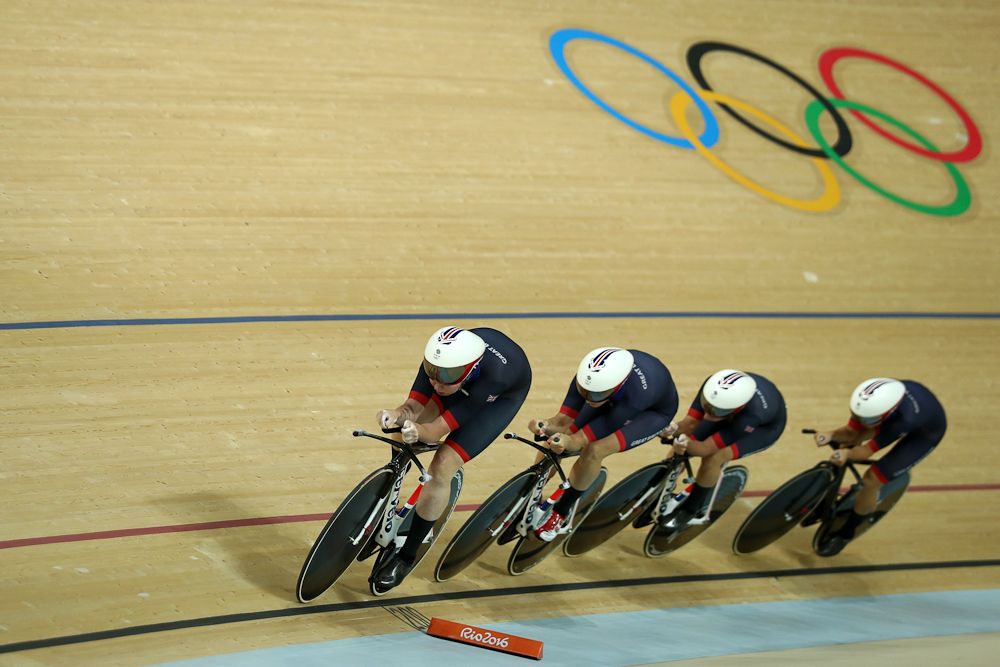 Great Britain pursuit squad on the track