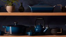 Wooden shelves with Le Creuset cookware in the new shade Nuit
