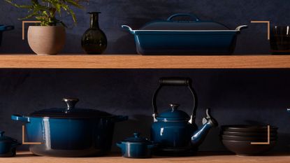 Wooden shelves with Le Creuset cookware in the new shade Nuit