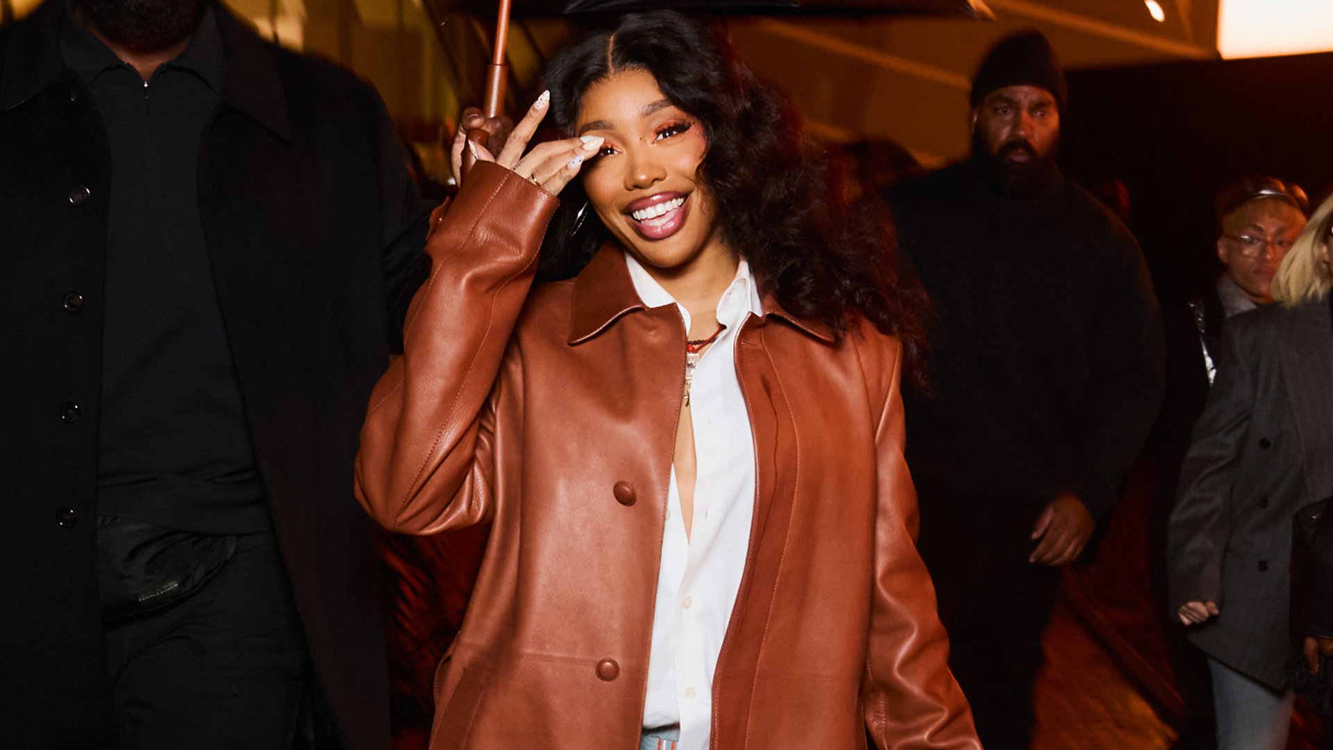 SZA attended the Louis Vuitton menswear show in custom Vans sneakers