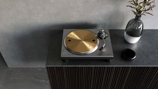 Technics SL-1300G on a black/grey credenza