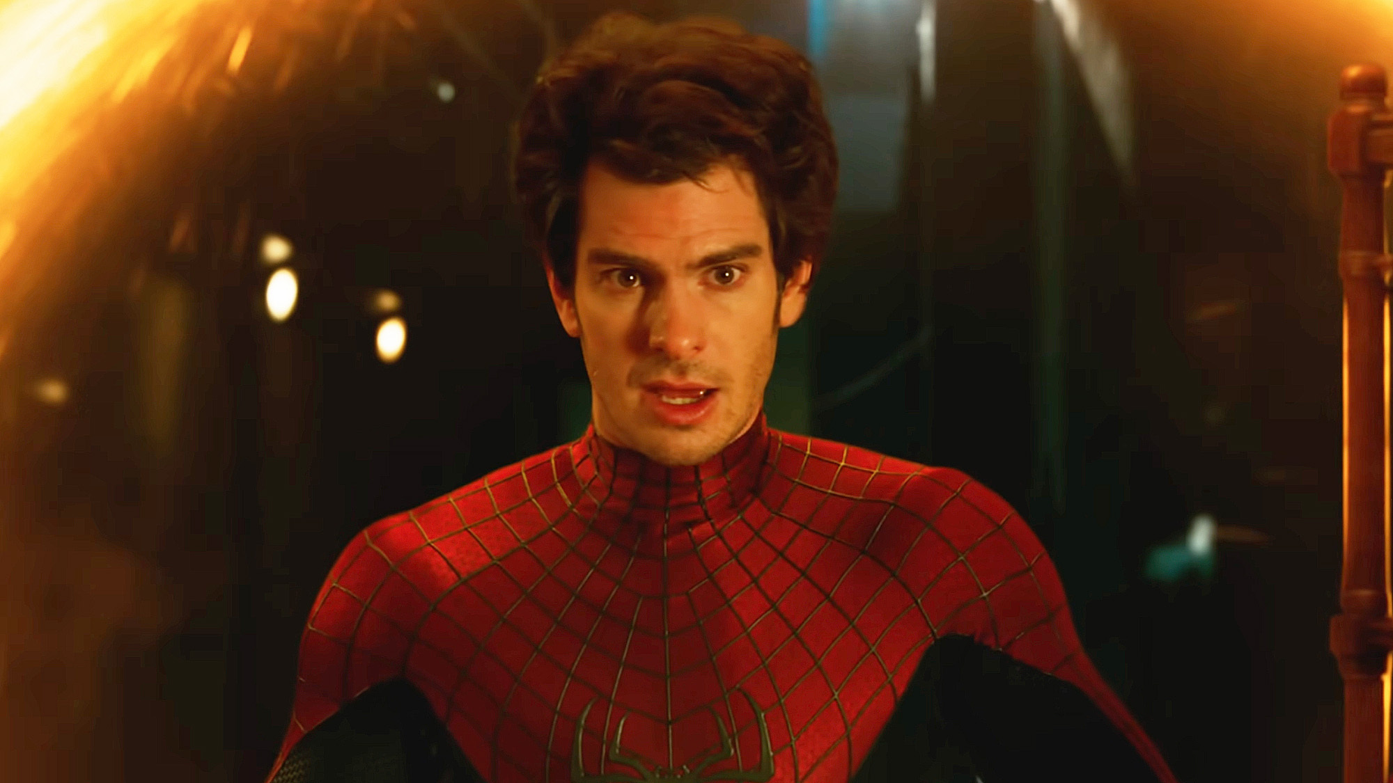 Peter Parker (Andrew Garfield) looks surprised after coming out of a portal in Spider-Man: No Way Home.