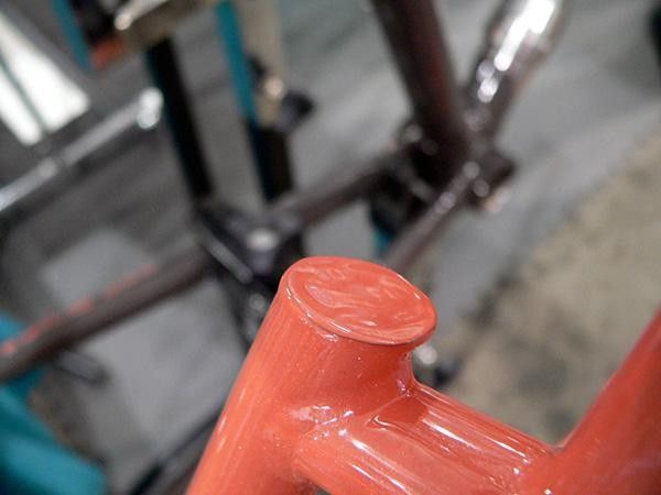 It&rsquo;s a bit difficult to pick it out - but that&rsquo;s an actual dime the Sycip brothers use to cap the seatstay on this mountain bike frame.