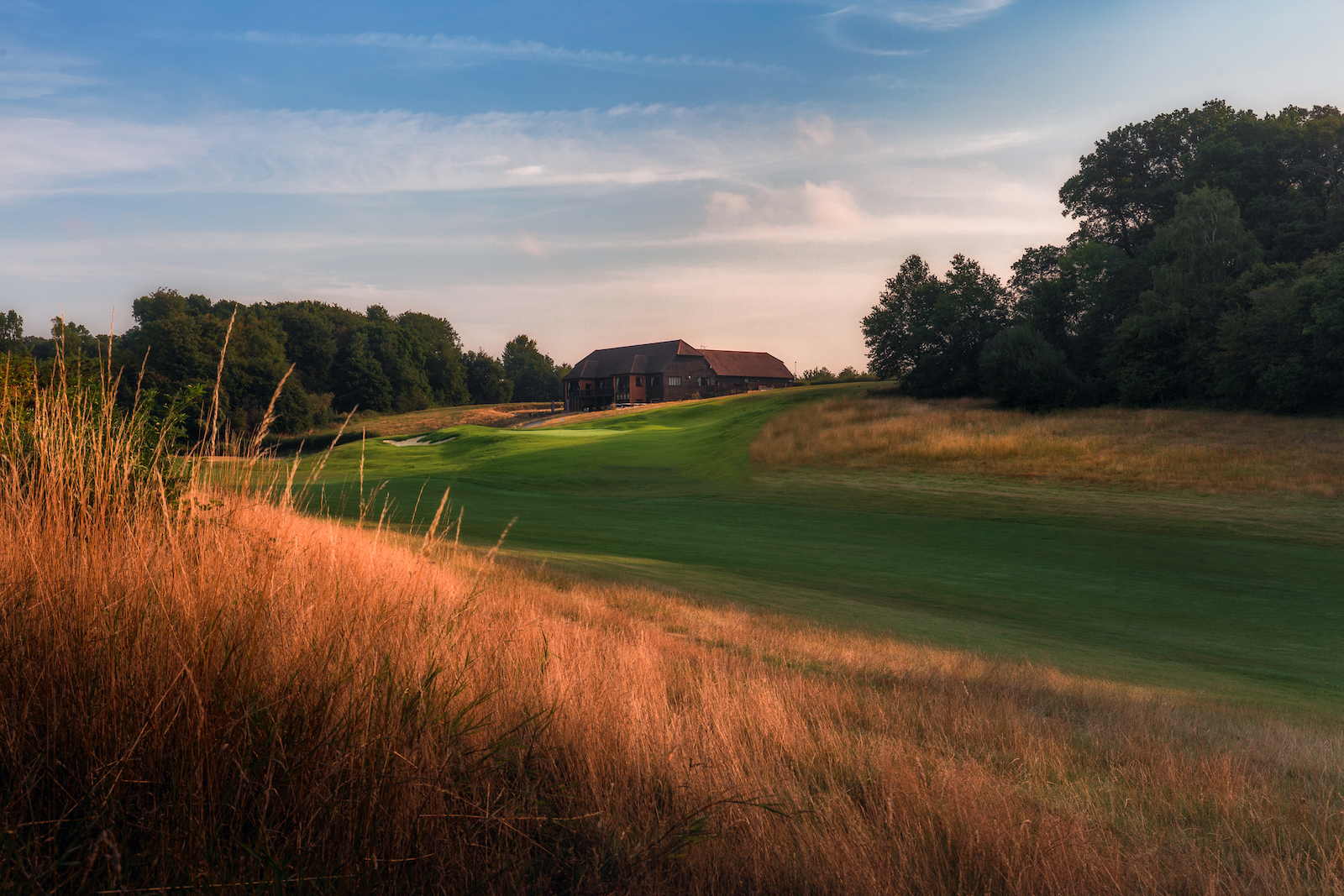 The 18th green and clubhouse at The Caversham