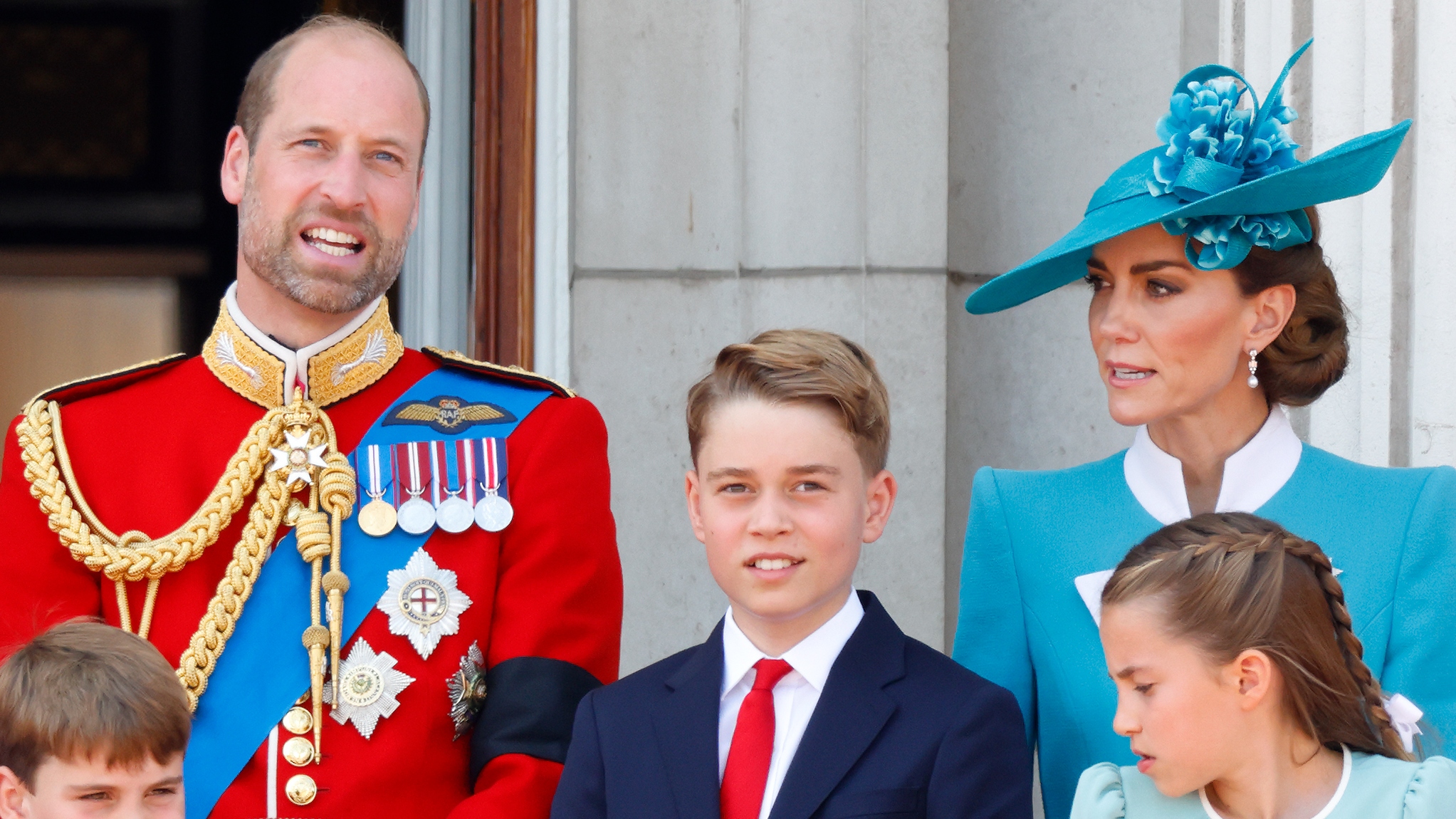 A close up picture of Prince William, Catherine and George on the balcony of Buckingham Palace after attending Trooping The Colour 2025