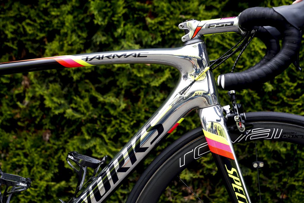 The pink, yellow and red colour is extended to the underside of the downtube