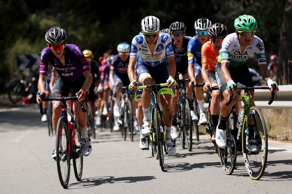 BALCON DE ALICANTE SPAIN AUGUST 20 LR Pelayo Sanchez Mayo of Spain and Team Burgos BH Rein Taarame of Estonia and Team Intermarch Wanty Gobert Matriaux polka dot mountain jersey and the peloton compete during the 76th Tour of Spain 2021 Stage 7 a 152km stage from Ganda to Balcn de Alicante lavuelta LaVuelta21 on August 20 2021 in Balcn de Alicante Spain Photo by Gonzalo Arroyo MorenoGetty Images