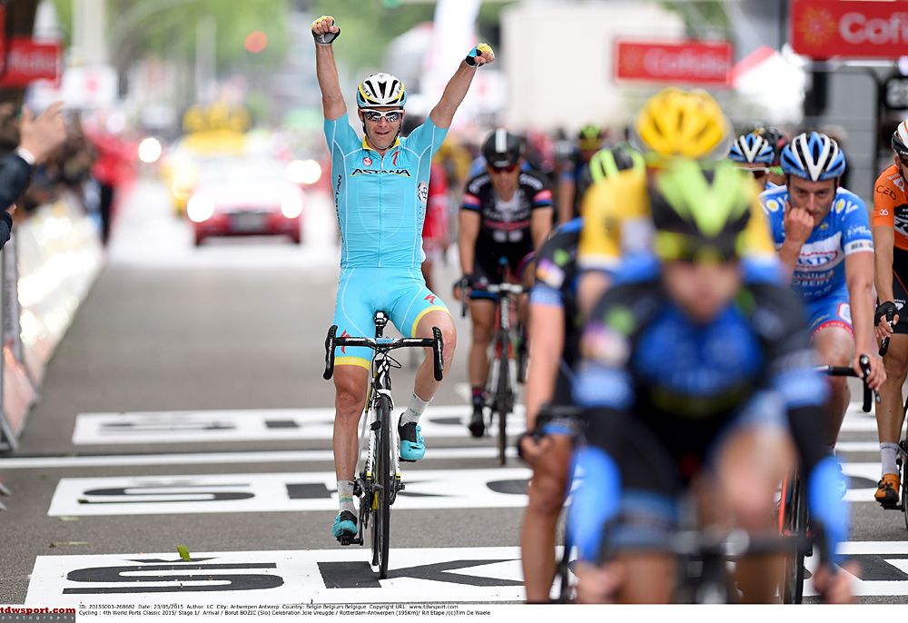 Borut Bozic sits up and celebrates his teammates stage win
