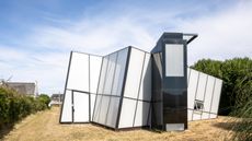 Maison de Verre, an angular white glass house in France by Studio Odile Decq