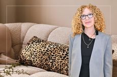 A comp image of the M&S X Kelly Hoppen leopard cushion on a sofa with an insert of Kelly Hoppen (R)