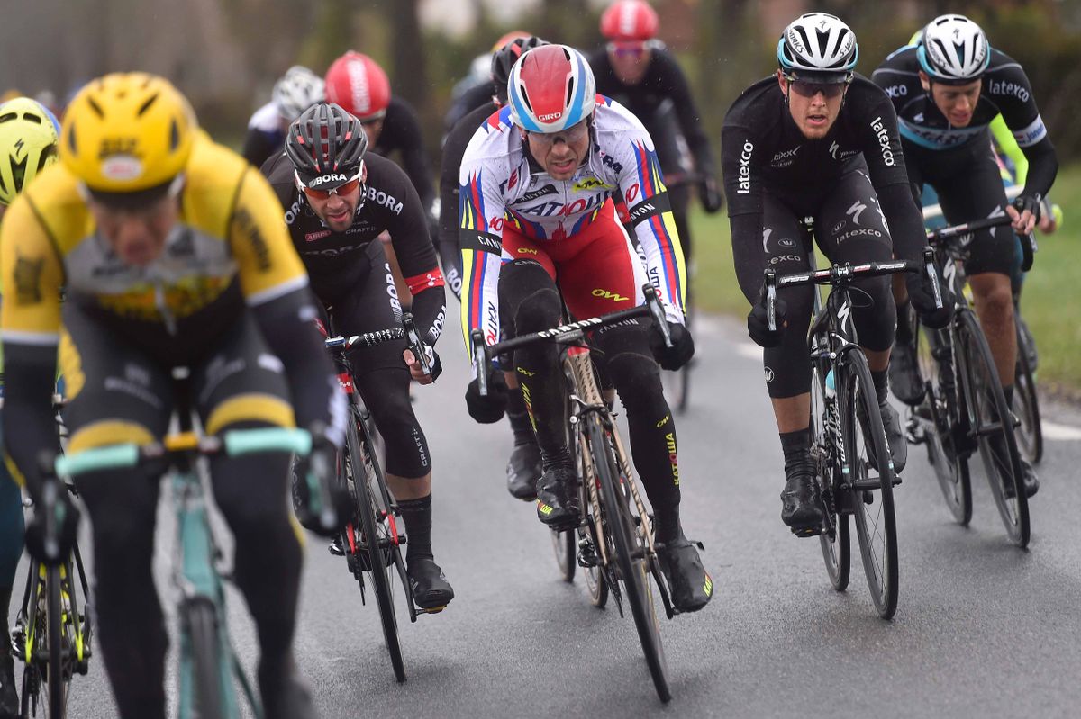 Riders were forced to ride on an angle to counter the strong cross winds just to stay upright