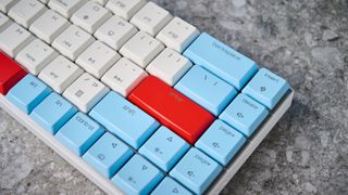 A Cherry MX LP 2.1 low-profile keyboard with red, white and blue keycaps