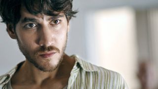 (L-R) Alberto Ammann as Juan in "Cell 211" now streaming on Netflix