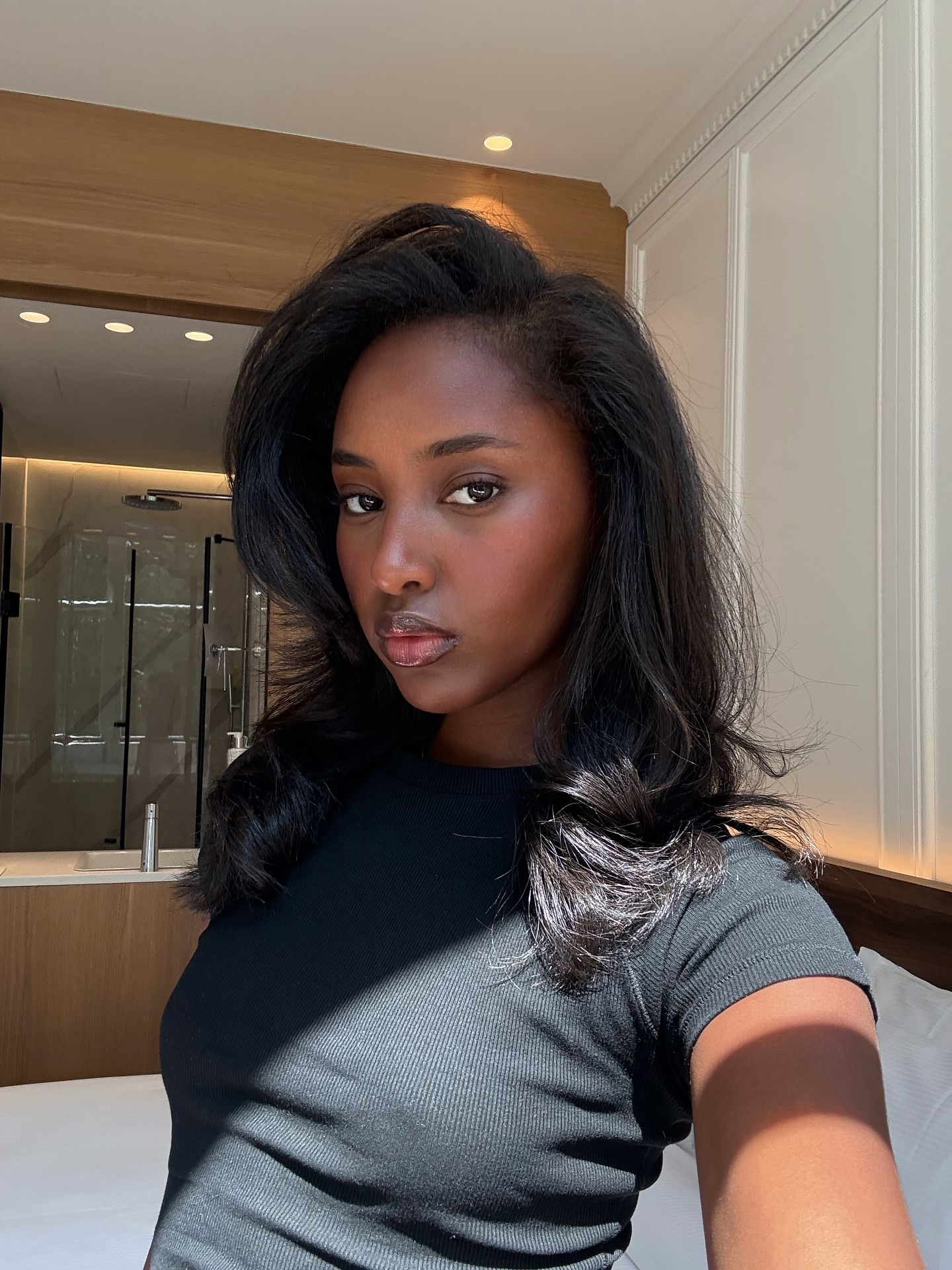 Ryan Xasan with two-toned lips and a fresh blowout