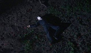 Halloween Michael Myers lies on the ground supposedly dead