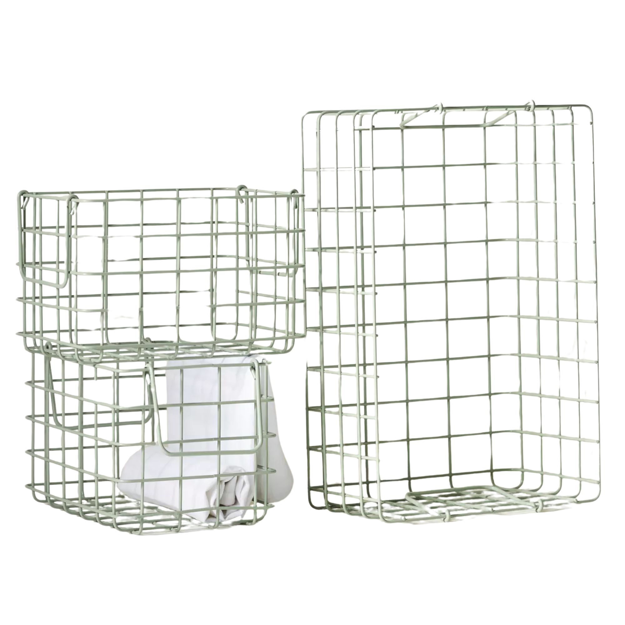 Three green wire basket crates with white towels