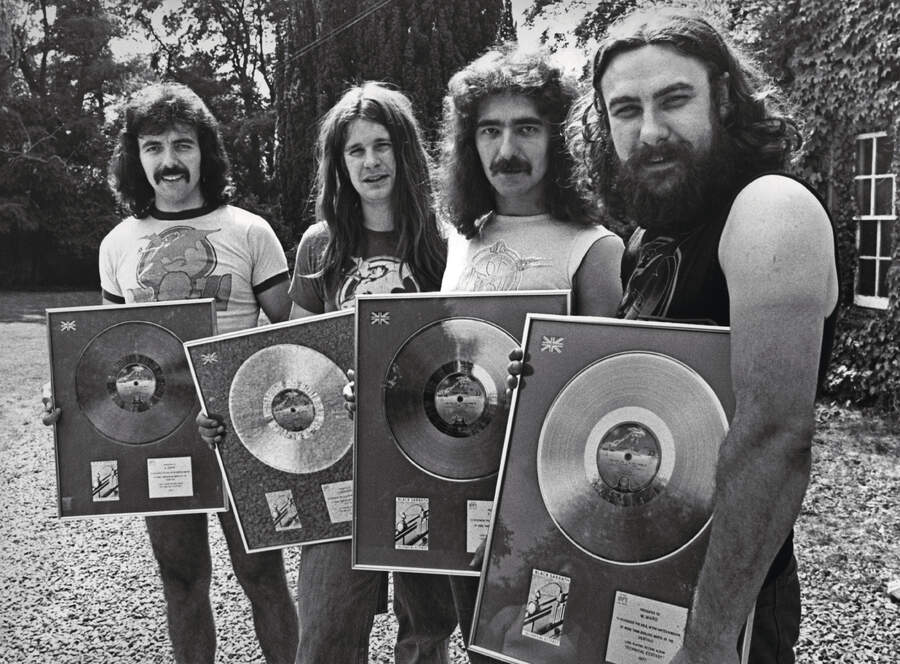 Black Sabbath pictured with the silver discs they received for the album "Technical Ecstasy".