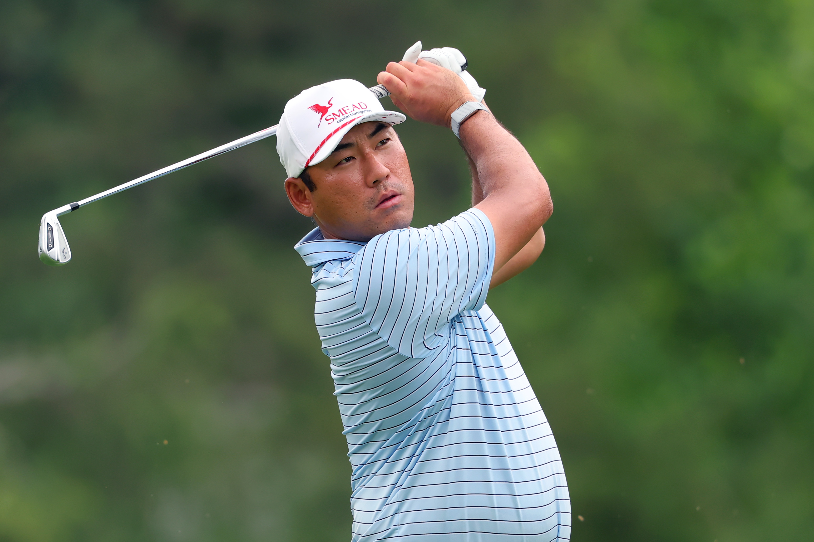 Chan Kim hits an iron shot