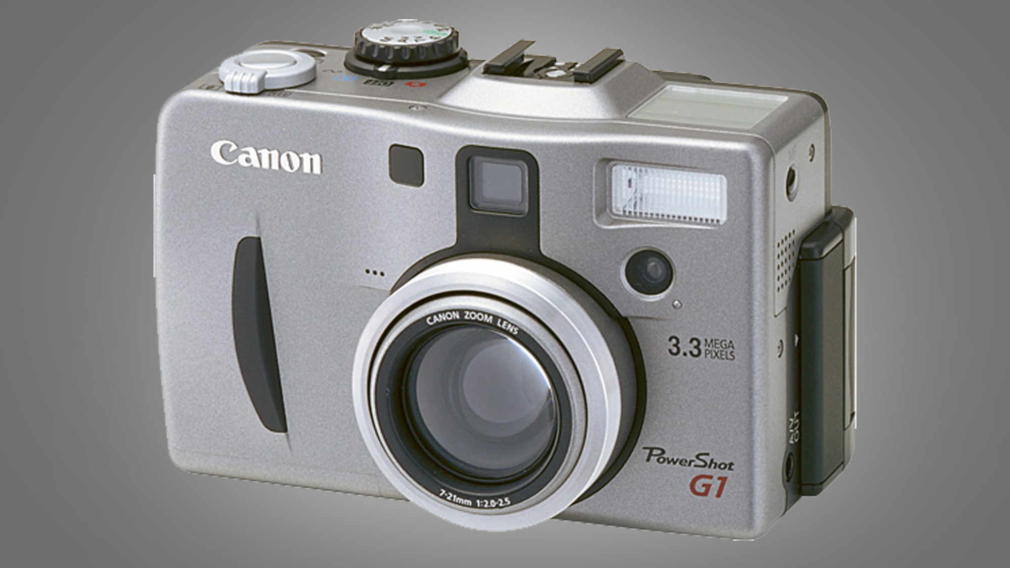The Canon PowerShot G1 camera on a grey background