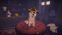 A puppy in a hat in Haunted Paws
