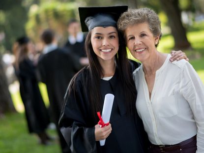 Student on her graduation day with her mother
