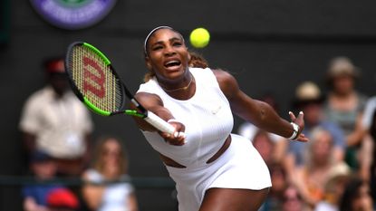 Serena Williams of The United States plays a forehand in her Ladies' Singles final