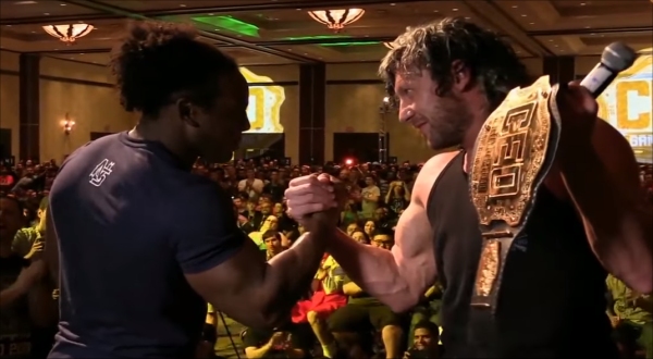 Xavier Woods (on the left) vs Kenny Omega (on the right)