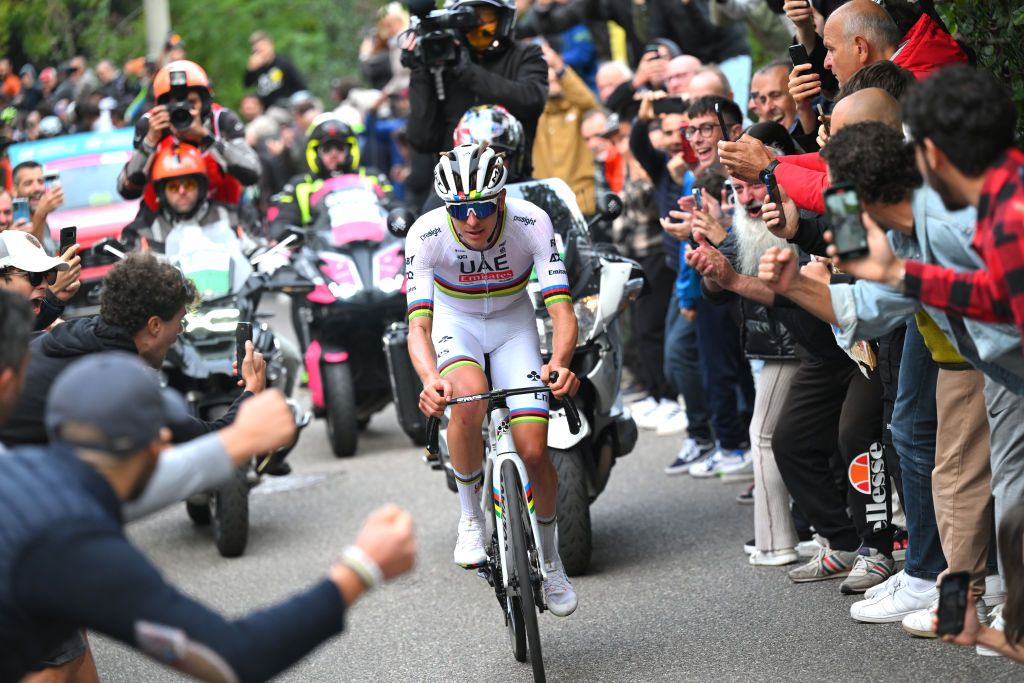 Race winner Tadej Pogacar attacks on Colma di Sormano while fans cheer during the 118th Il Lombardia 2024 