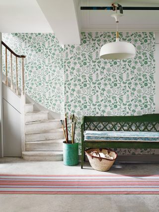 Hallway with patterned wallpaper