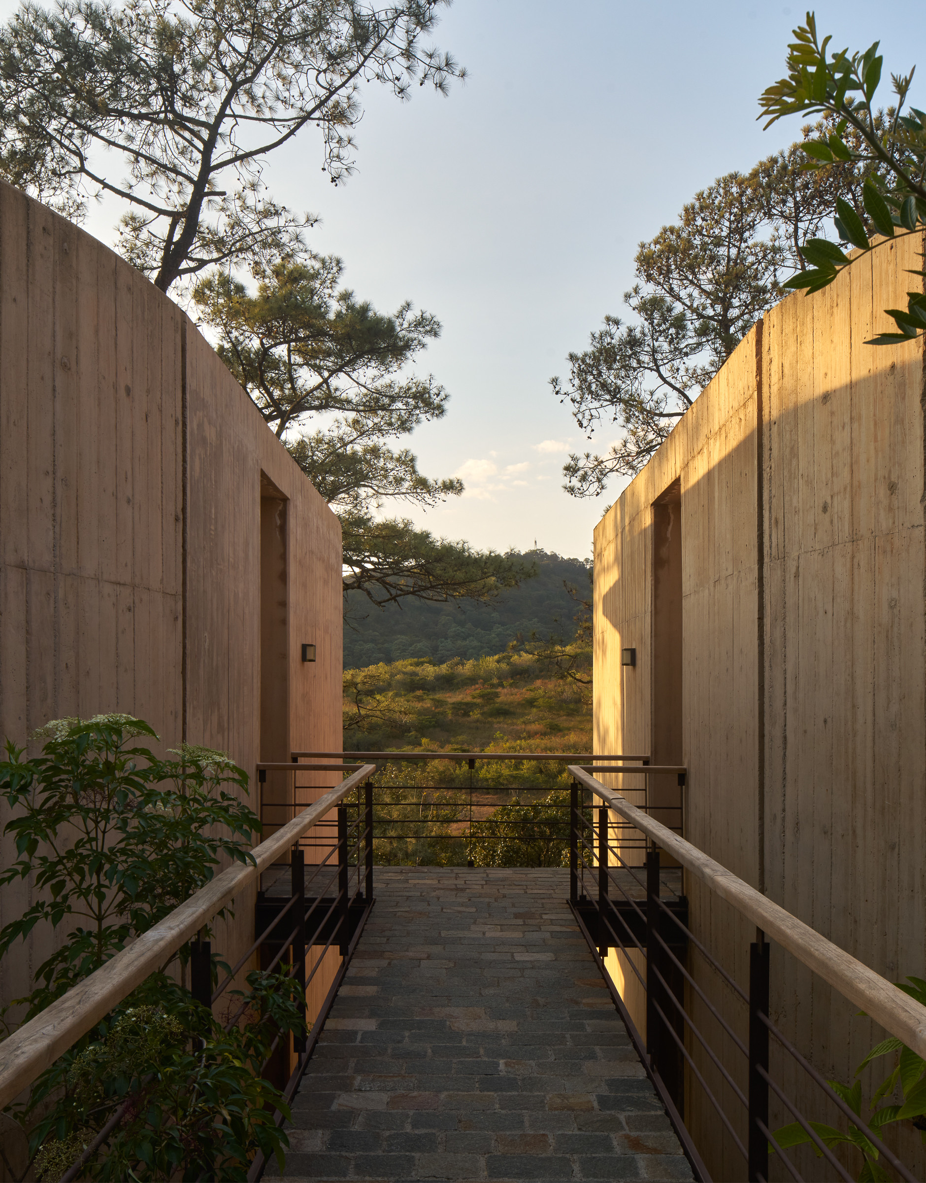 External walkways lead to the four individual pavilions
