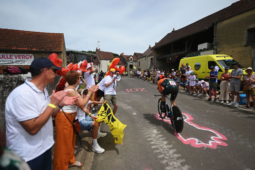 GEVREYCHAMBERTIN FRANCE JULY 05 Michael Matthews of Australia and Team Jayco AlUla sprints while fans cheer during the 111th Tour de France 2024 Stage 7 a 253km individual time trial stage from NuitsSaintGeorges to GevreyChambertin UCIWT on July 05 2024 in GevreyChambertin France Photo by Dario BelingheriGetty Images