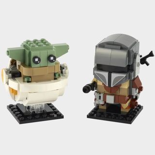 Lego The Mandalorian and The Child on a plain background