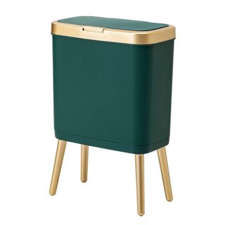 A green trash can with gold accents