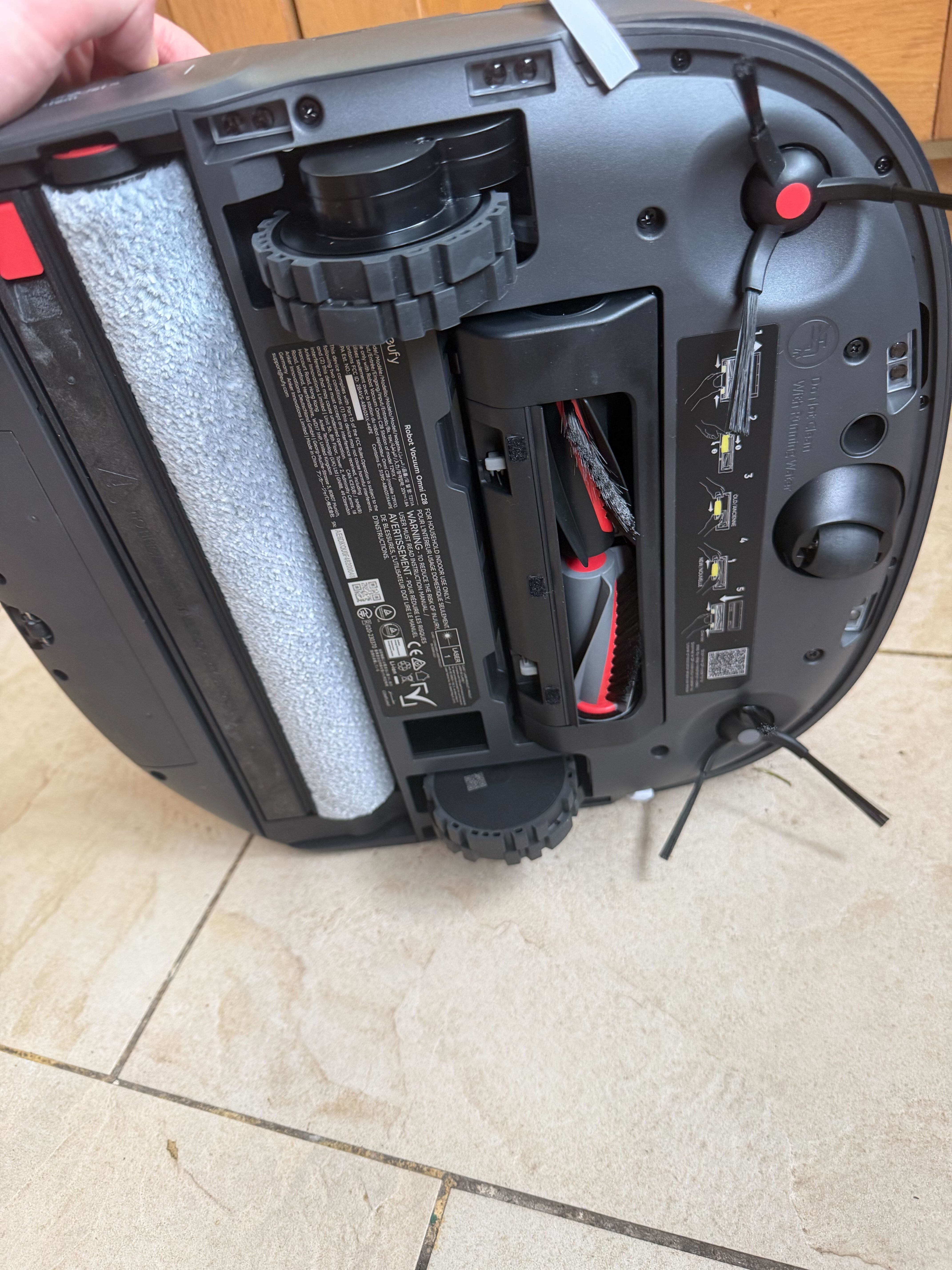The underside of a eufy Omni C28 robo vac and mop
