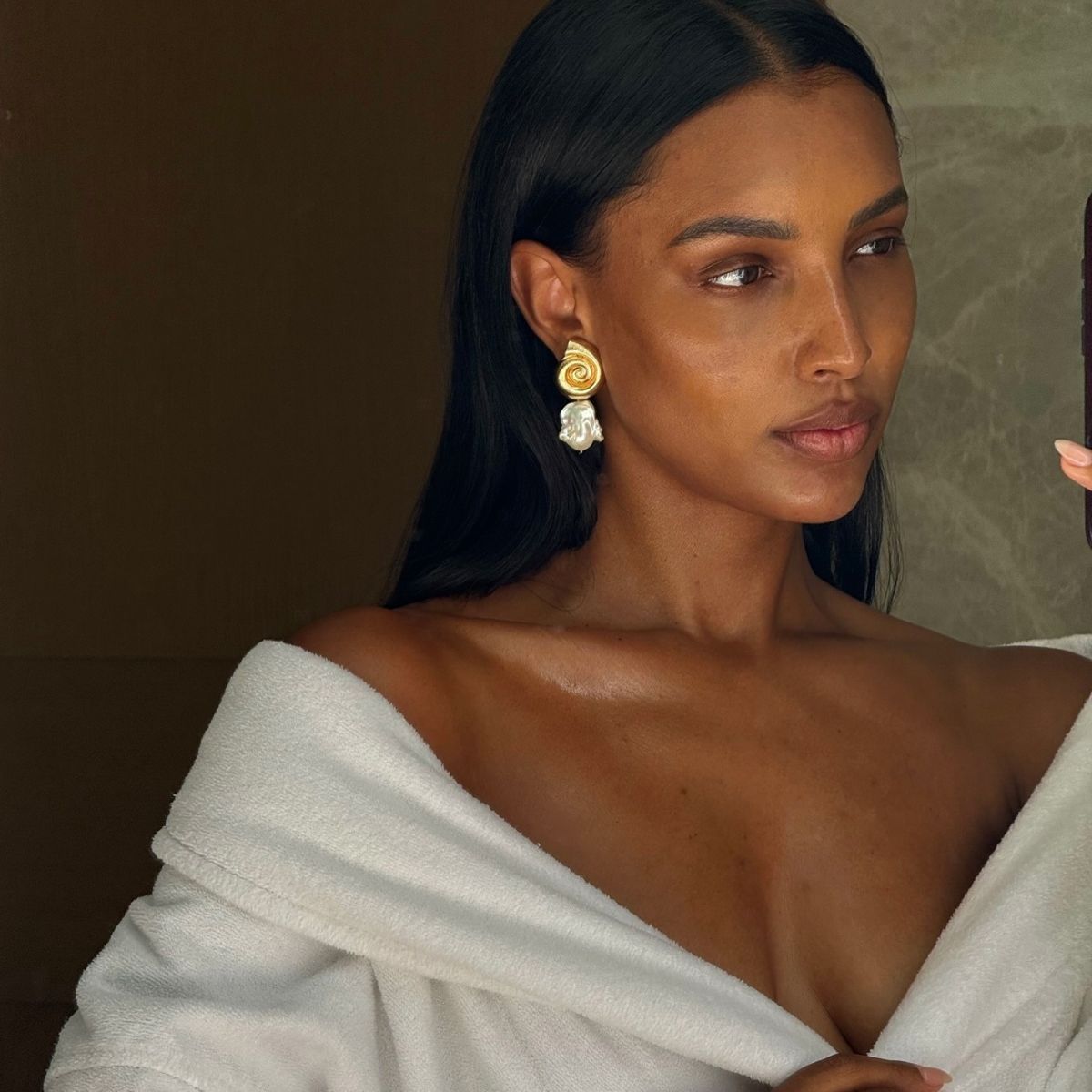 Jasmine Tookes in white dressing gown