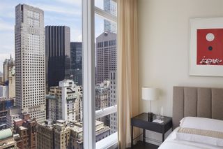 bedroom with NY views at Baccarat Residence NYC Architect Joe Serrins Studio