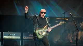 Joe Satriani performs on stage during the G3 tour stop at The Magnolia on February 07, 2024 in El Cajon, California.