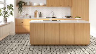 oak cabinets with patterned flooring in modern kitchen