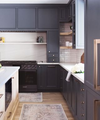 Black cabinets, rug, white tiles