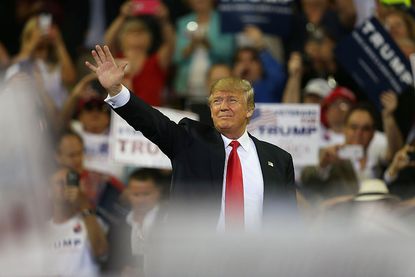 Donald Trump greets supporters in Orlando, Florida.