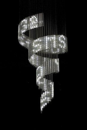 Lolita, 2004. A spiraling chandelier made from lights which make words.