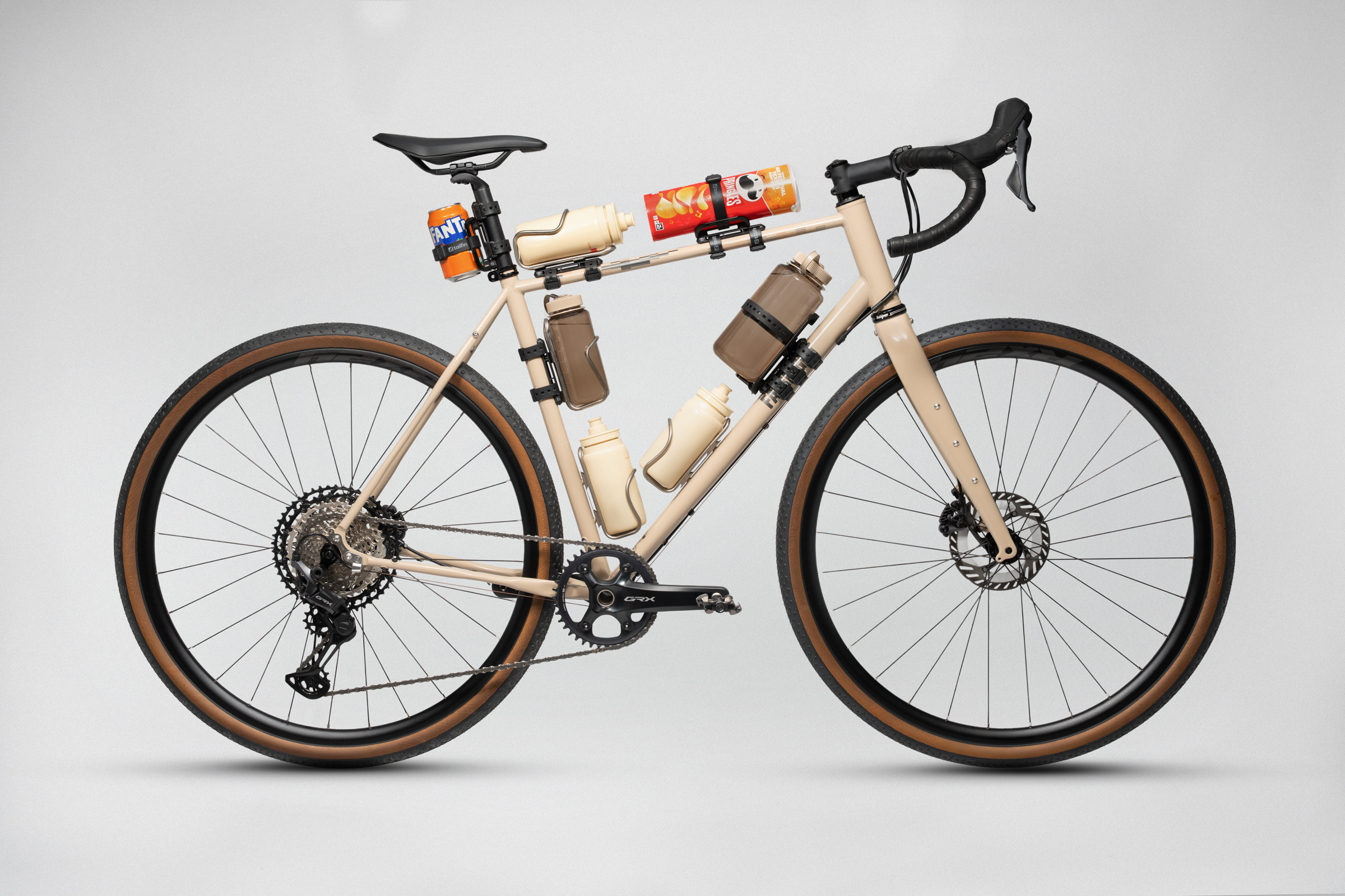 Various studio shots of Tailfin's hydromount on a gravel bike