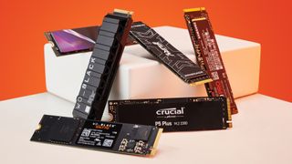 A collection of NVMe SSDs on orange.