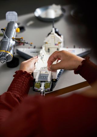At 1:70 scale, Milan Madge and his fellow Lego designers had the room needed to include small details in the NASA Space Shuttle Discovery set, such as both decks of the crew cabin, cameras in the payload bay and elevons that move opposite each other.