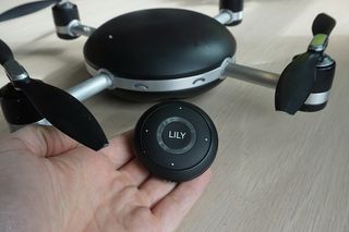 The tracking puck enables GPS navigation and includes basic controls for the drone.