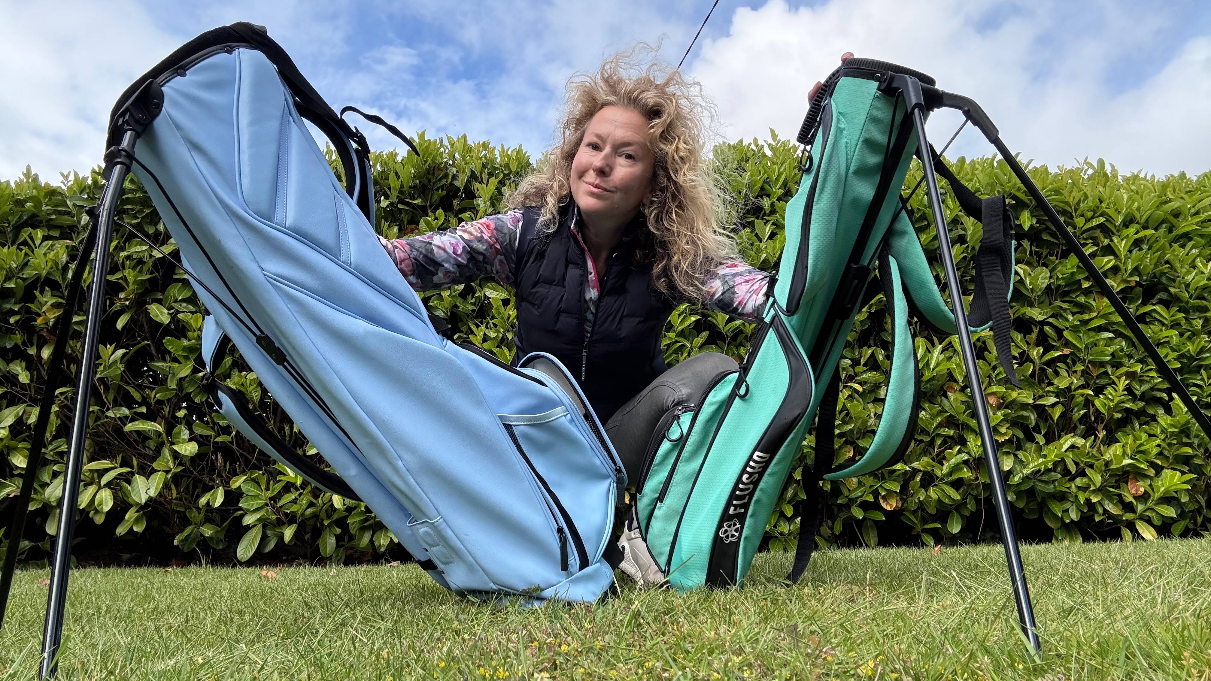 Katie Dawkins with two golf bags