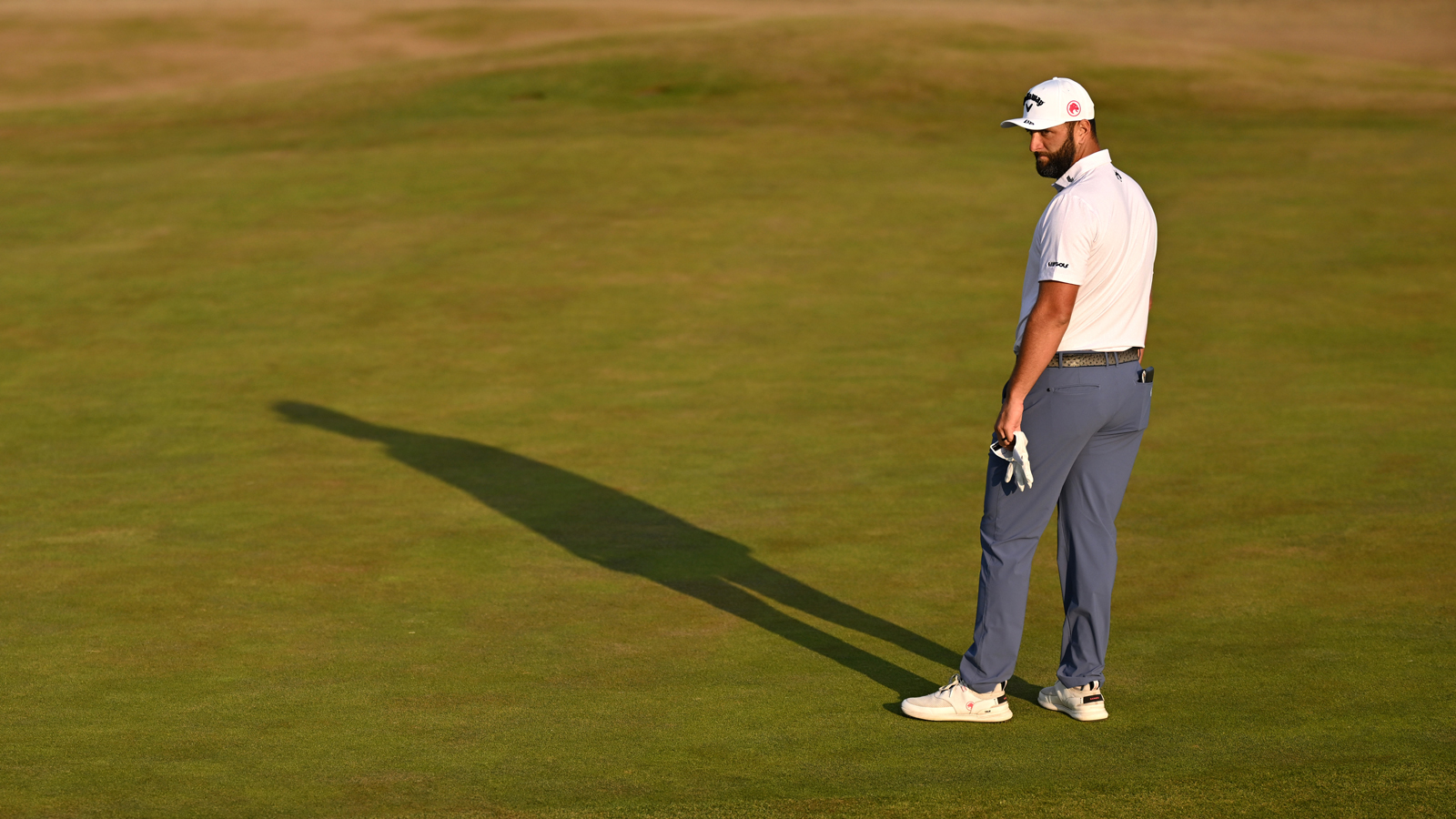 Jon Rahm reacts after a missed putt