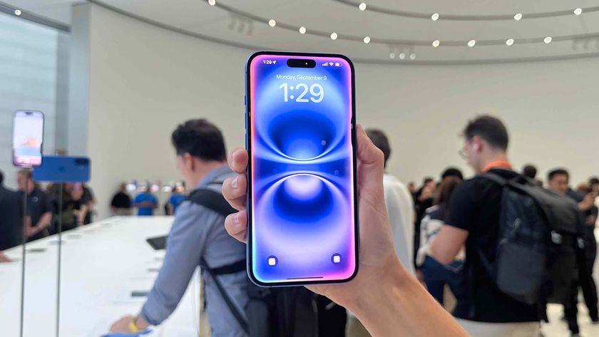 The iPhone 16 Plus being held