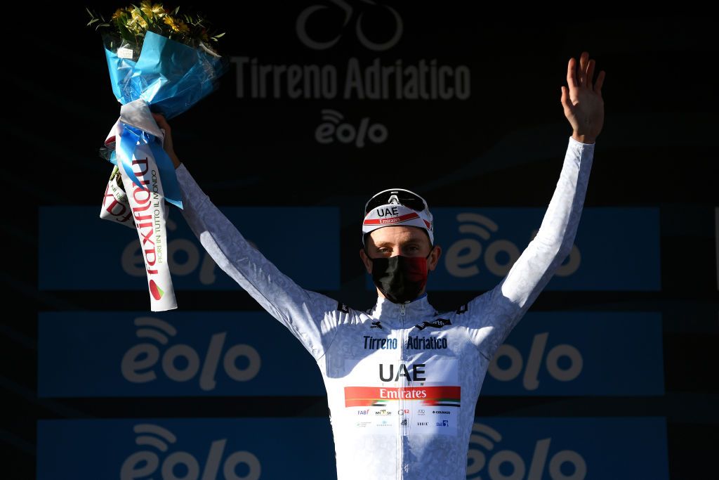 PRATI DI TIVO ITALY MARCH 13 Podium Tadej Pogacar of Slovenia and UAE Team Emirates White Best Young Rider Jersey Celebration during the 56th TirrenoAdriatico 2021 Stage 4 a 148km stage from Terni to Prati di Tivo 1450m Mask Covid Safety Measures TirrenoAdriatico on March 13 2021 in Prati di Tivo Italy Photo by Tim de WaeleGetty Images