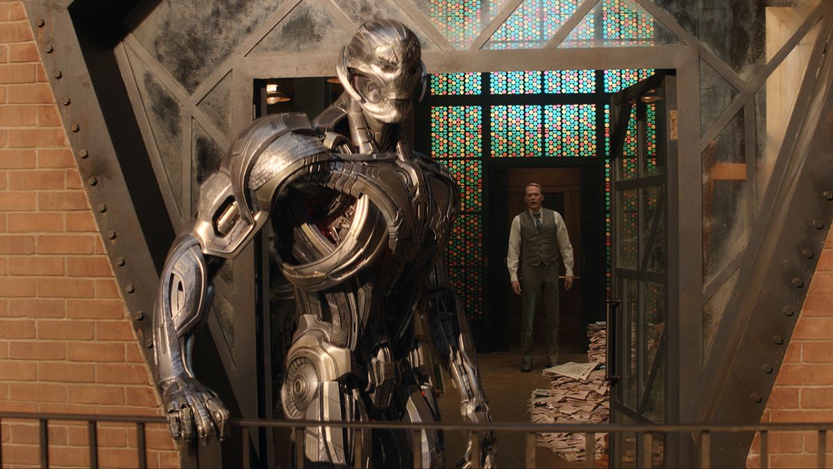 Ultron standing on a balcony with Vision in the background in VisionQuest